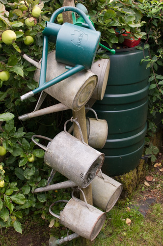 Time to hang up the watering cans